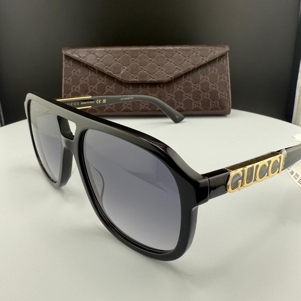 Gucci Black Sunglasses with Gold Logo Accent